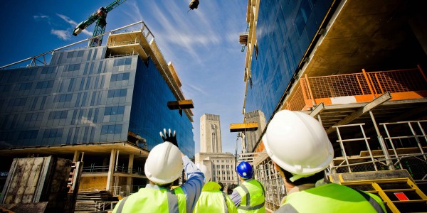building-under-construction-with-workers-shutterstock_57862405